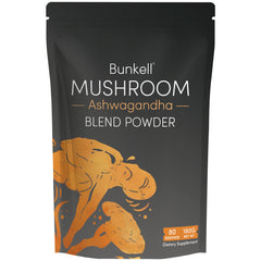 Serving spoon with mushroom powder and prepared drink