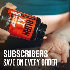 Burn-XT bottle with gym accessories in the background