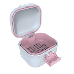 Close-up of leak-proof denture case designed for soaking and handling