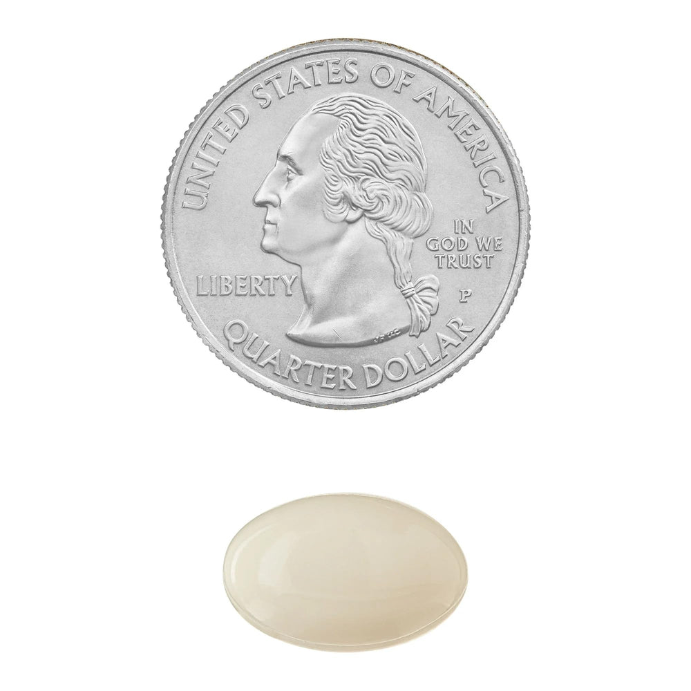 Bottle beside a glass of water for daily use