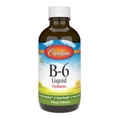Carlson Labs Vitamin B-6 Liquid bottle on a kitchen counter, suggesting daily energy production support.