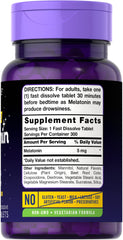 Close-up of berry flavored 5 mg melatonin fast dissolve tablet