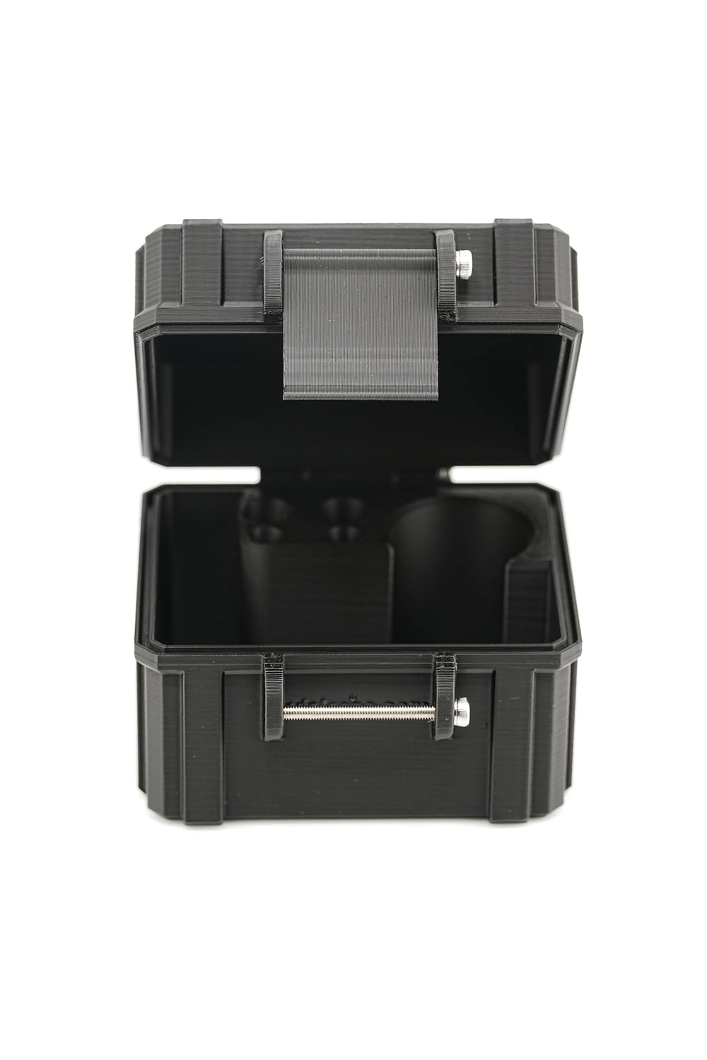 Open storage case showing multiple compartments for lens tools