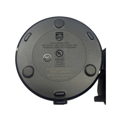 Black CELADON charging base on a white surface with logo