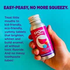 Close-up of a single toothpaste tablet – berry flavor