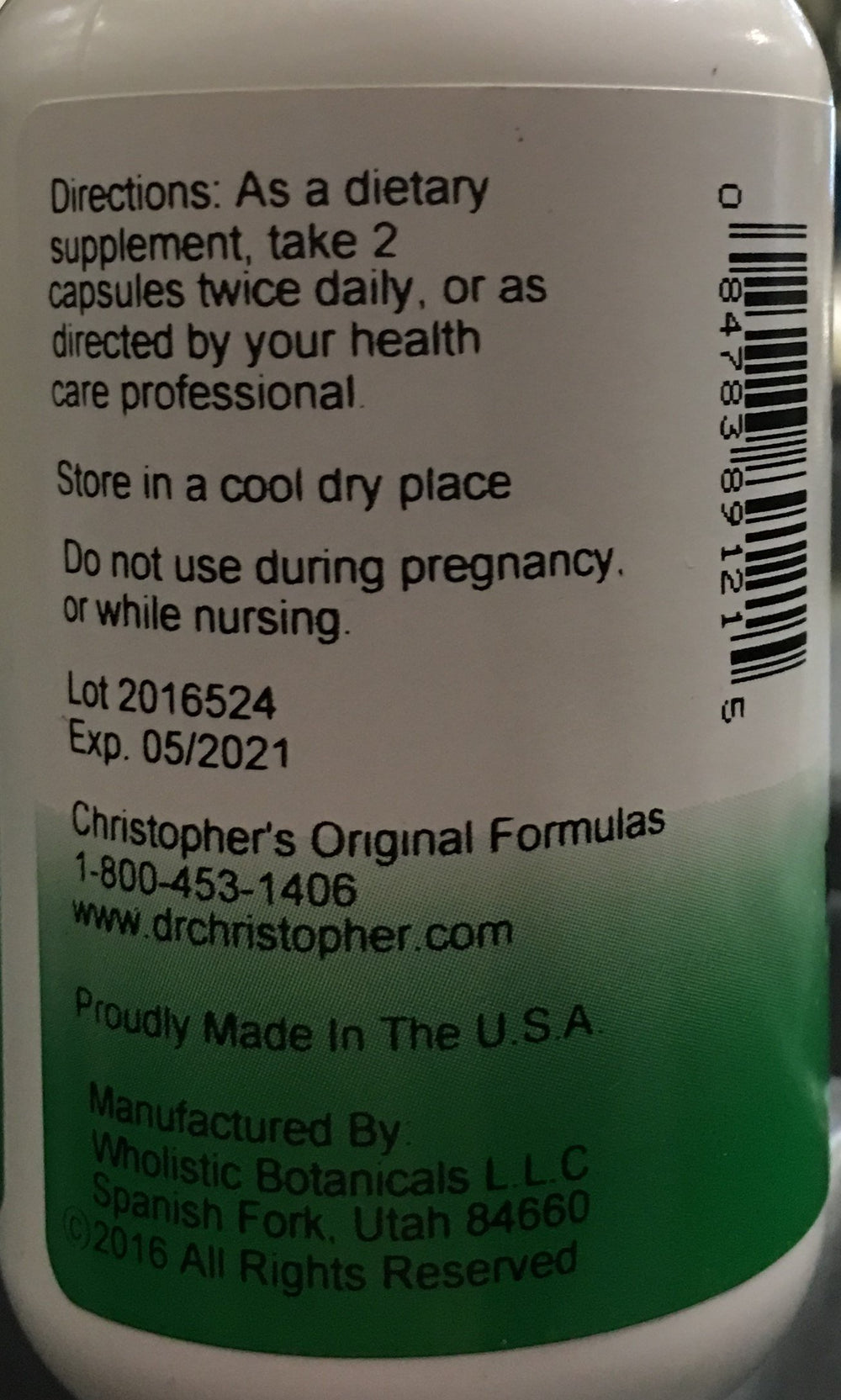 Close-up of herbs and supplement bottle for Christopher's Original Formulas Female Reproductive Formula