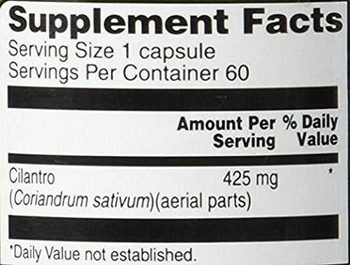 Close-up of cilantro (coriander) capsule labeled 425 mg