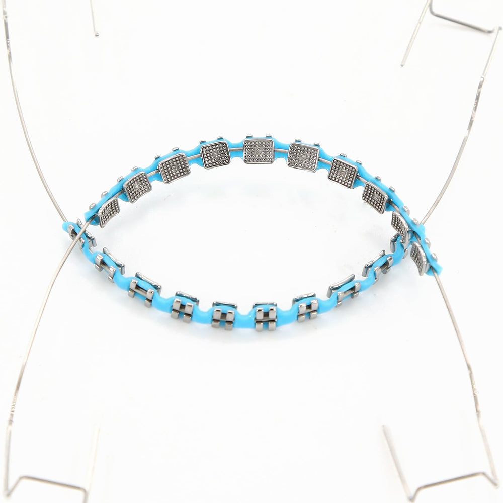 Classroom teaching prop for orthodontics featuring blue braces.