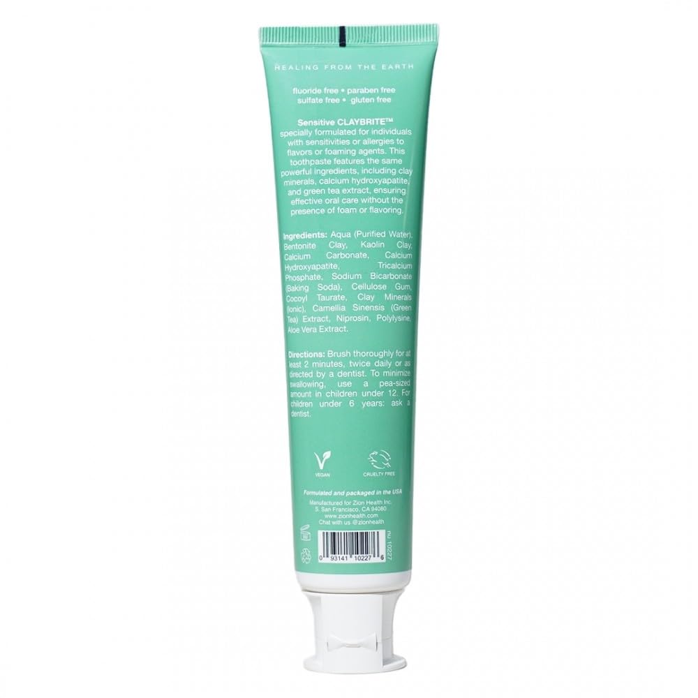 Close-up of ClayBrite toothpaste tube with white clay and green tea ingredients