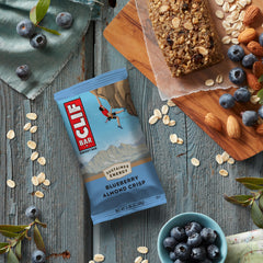 CLIF Bar Blueberry Almond Crisp bar on a backpack ready-to-eat snack.