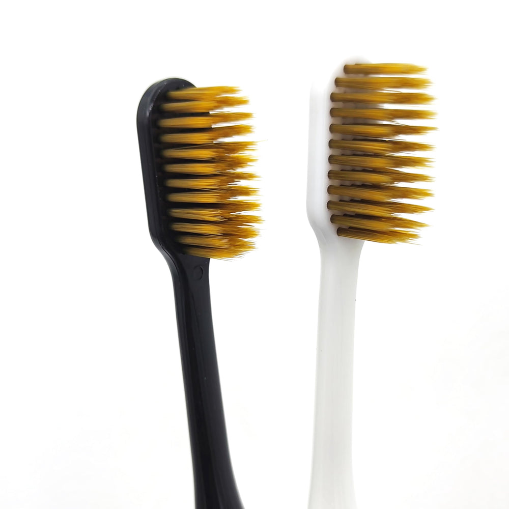 Soft toothbrush with compact head designed for sensitive teeth