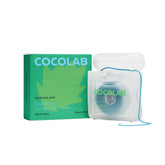 Cocofloss woven dental floss mint spool close-up