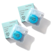 Coconut-oil infused woven dental floss with mint flavor