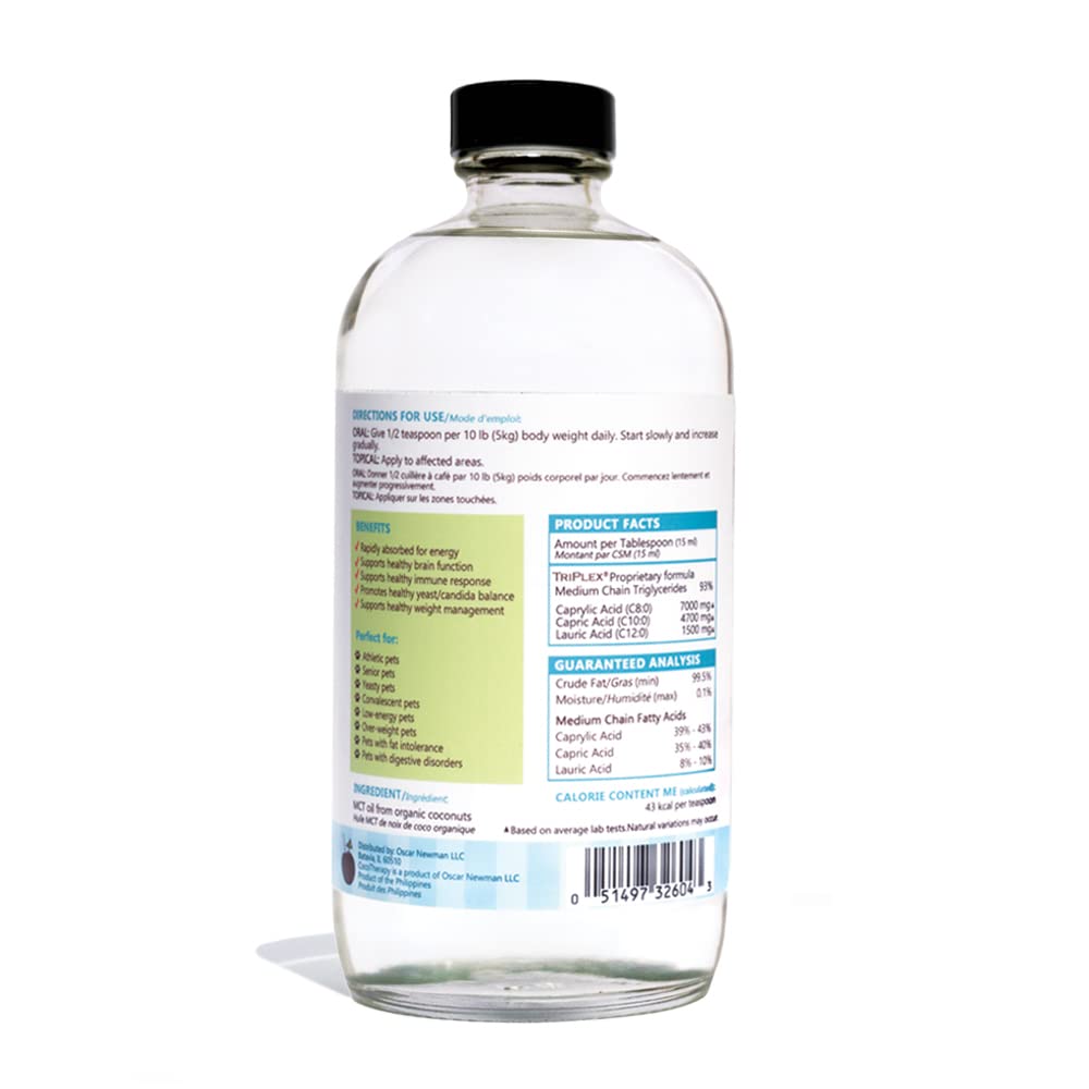 Pouring CocoTherapy Triplex MCT-3 Oil onto dog food