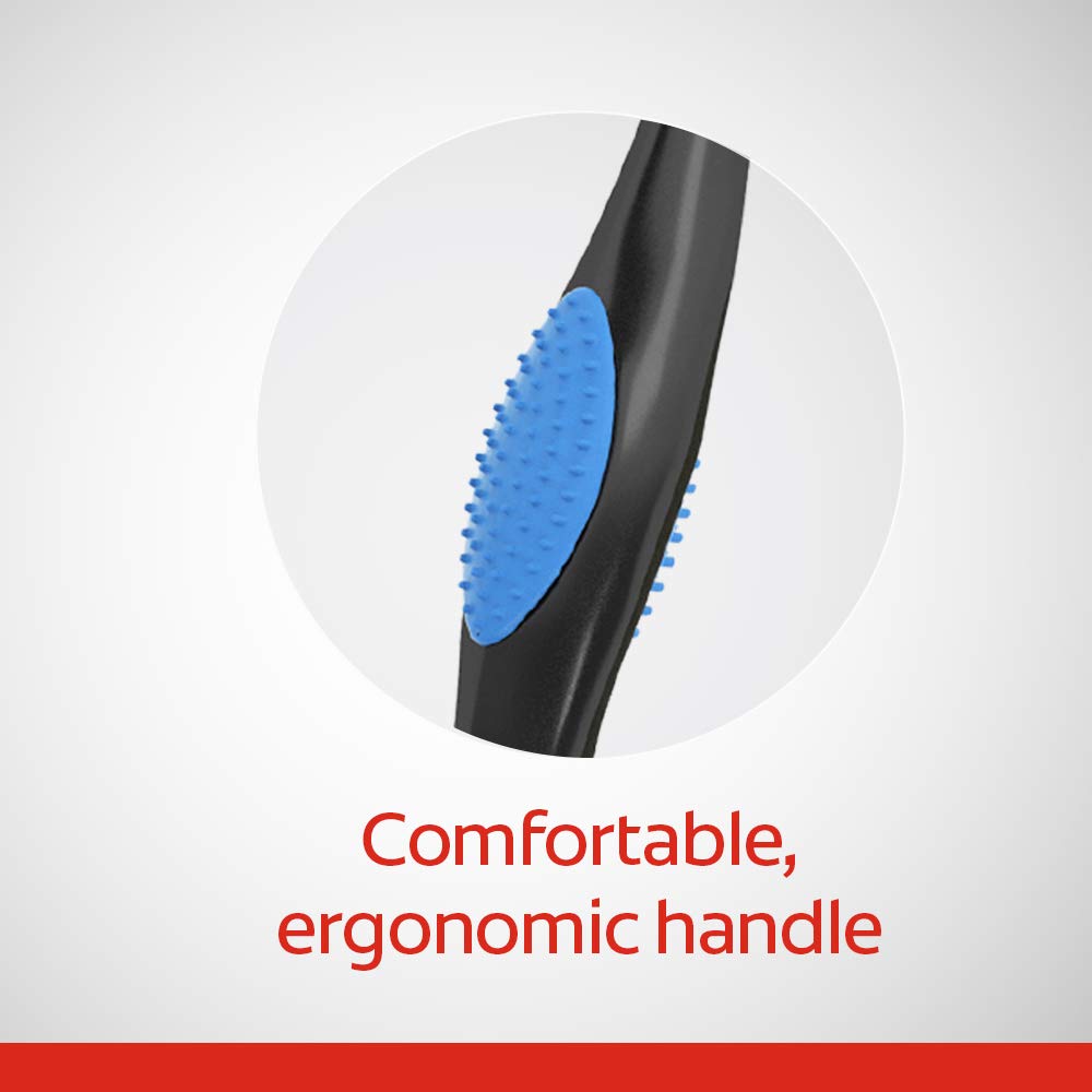 Back of the toothbrush displaying the cleaner for tongue, cheeks, and gums