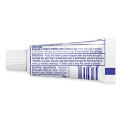 Close-up of Colgate toothpaste tube with mint flavor