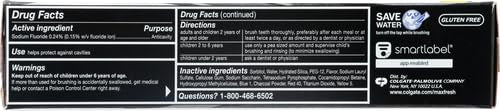 Open toothpaste tube showing gel and charcoal specks