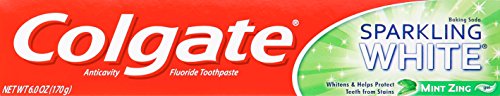 Close-up of Colgate toothpaste tube showing mint flavor