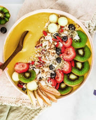Collagen powder being mixed into a smoothie