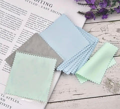Compact pack of microfiber cloths for cleaning in product display