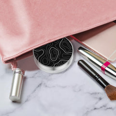 Compact case with solution bottle and included accessories