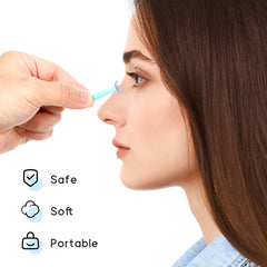 Close-up of soft rubber eye contact lens remover tool