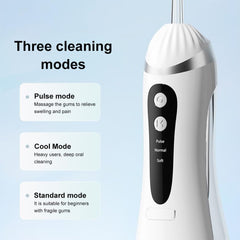Ergonomic white and blue cordless water flosser in hand