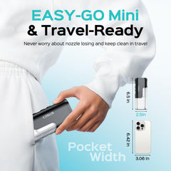 Compact COSLUS travel water flosser in hand for scale