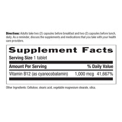 B12 bottle being held for scale