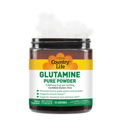 Glutamine powder being poured from the scoop