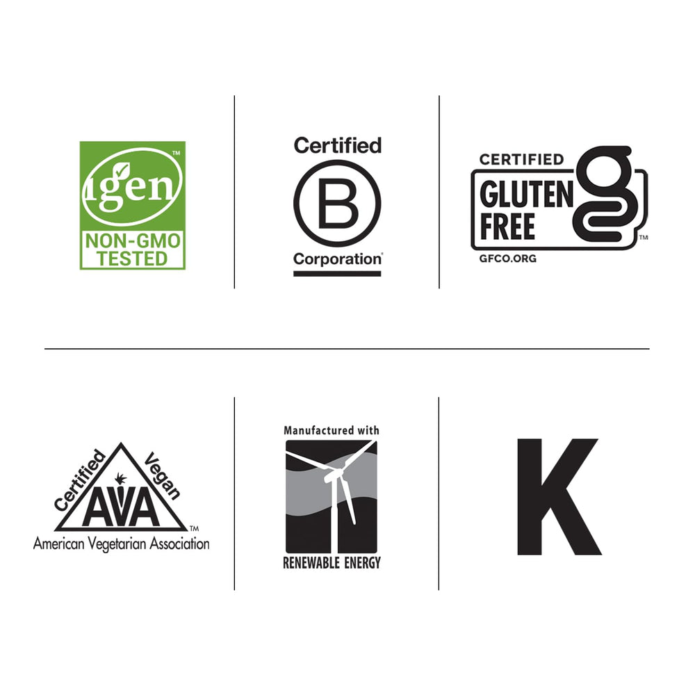 Lifestyle image of L-Lysine capsules beside a glass of water