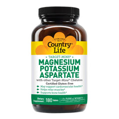 Bottle with glass of water and capsules to illustrate intake