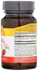 Close-up of strawberry-flavored K2 chewable tablet