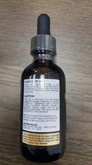 Creatine HCl liquid drops being mixed with water