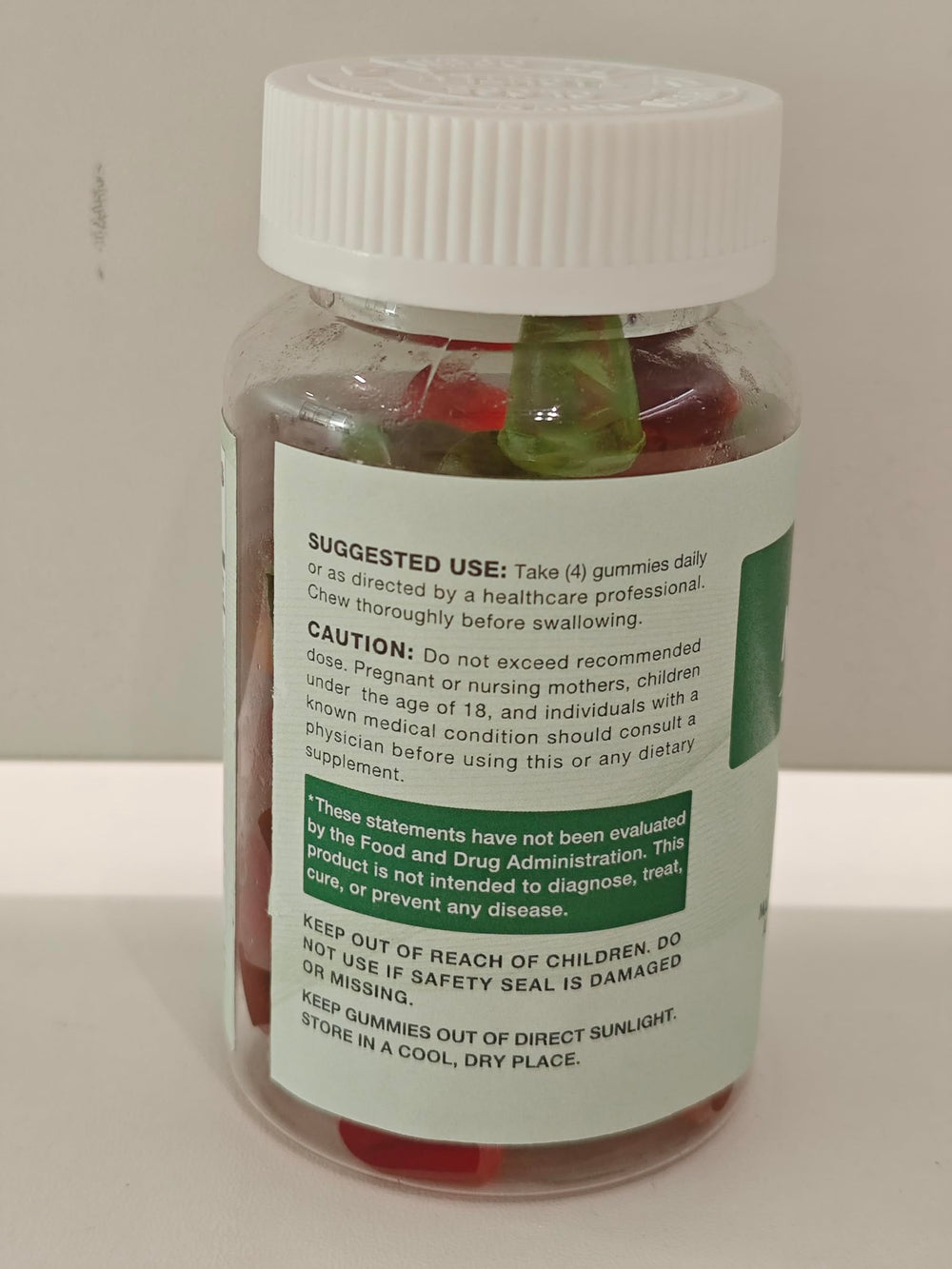 Athlete performing workout with pre-workout gummies nearby