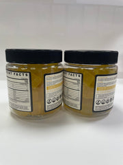 Gummies on white surface with lemon slice