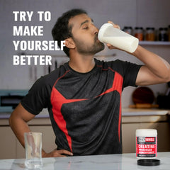 Creatine Monohydrate powder being mixed into a beverage