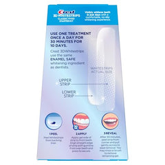 Person applying Crest 3D Whitestrips Classic Vivid whitening strips