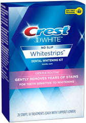 Applying whitening strips to lower teeth