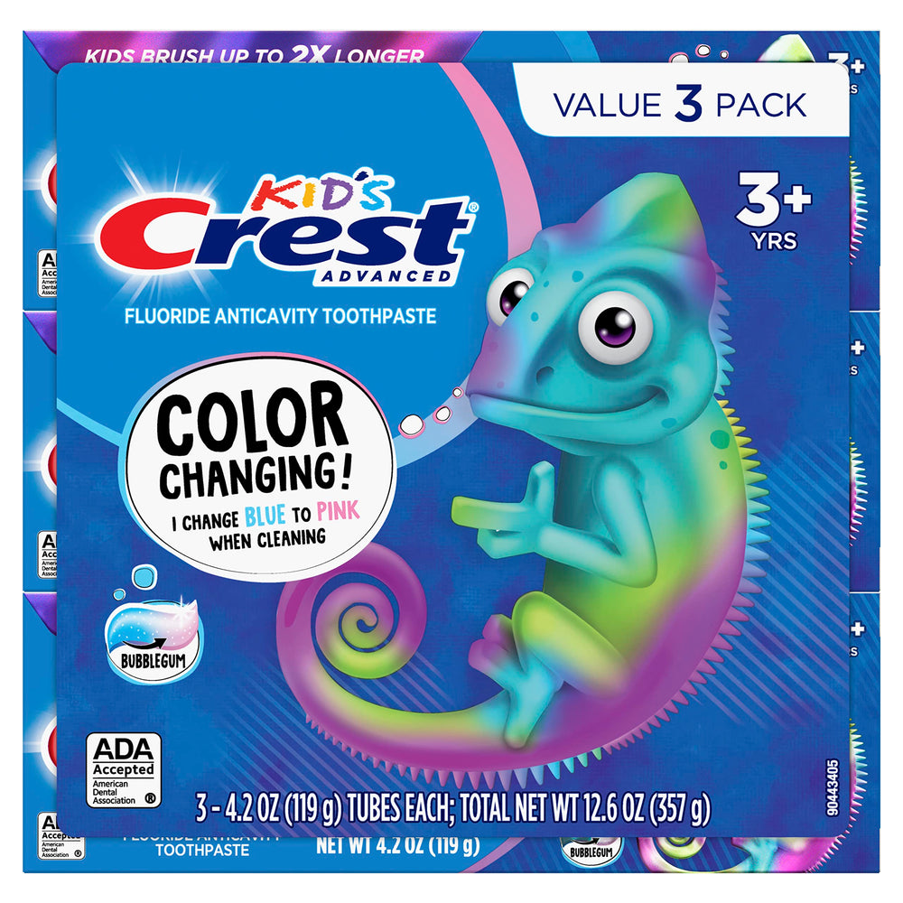 Close-up of Crest Kids toothpaste tube featuring blue-to-pink color change