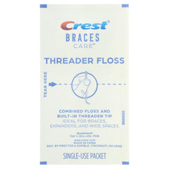 Plaque removal between teeth with Crest Braces Care Threader Floss