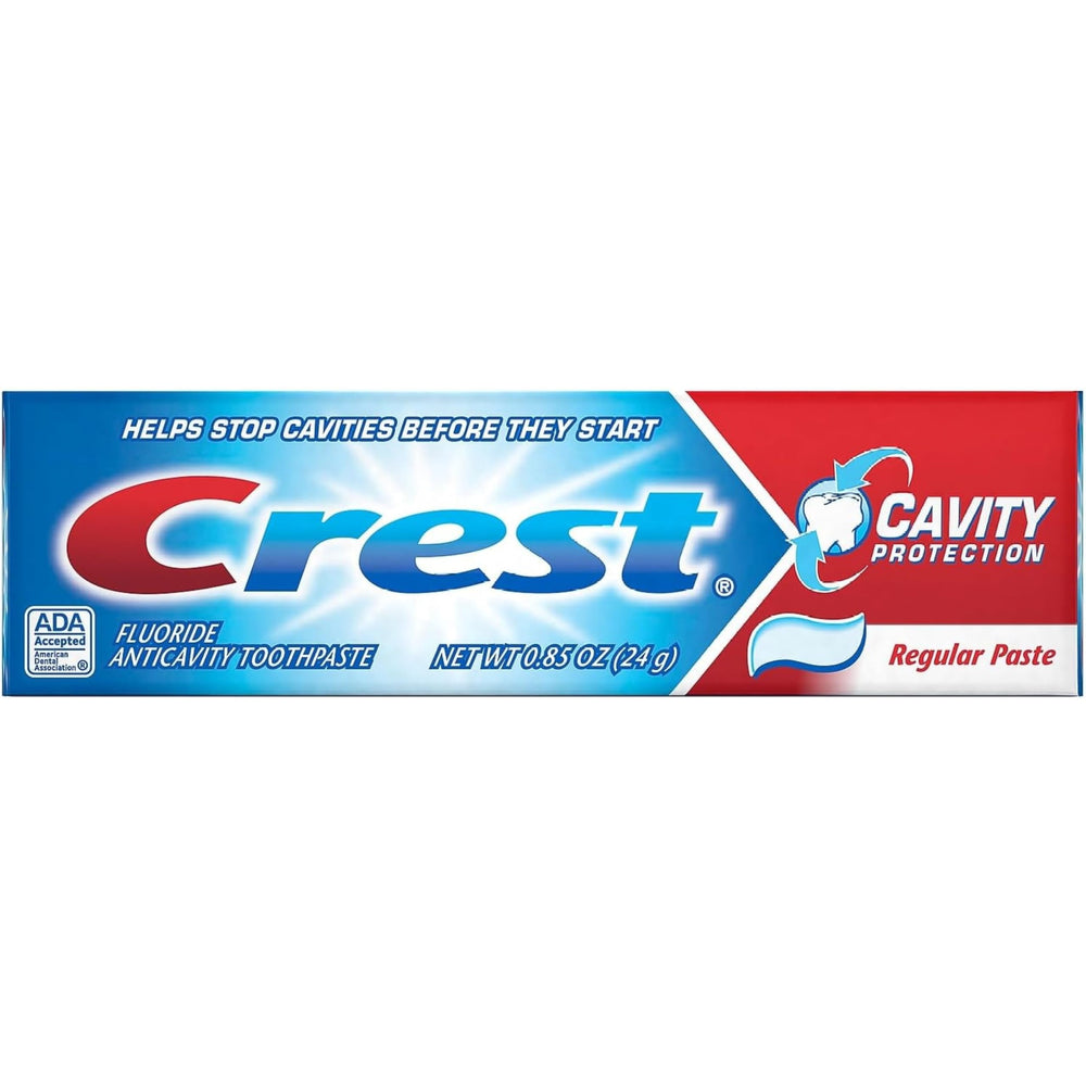 Front view of Crest Cavity Protection travel-size toothpaste packs containing 12 tubes