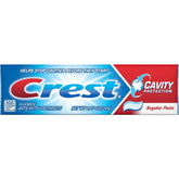 Front view of Crest Cavity Protection travel-size toothpaste packs containing 12 tubes