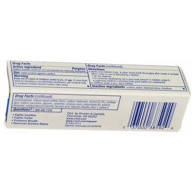 Minty fresh Crest Complete Whitening Plus Scope travel-size toothpaste label