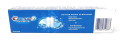 Open Crest Premium Plus 3-pack box with toothpaste tubes visible