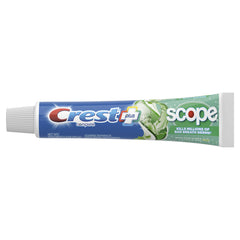 Close-up of Crest + Scope toothpaste tube with minty freshness label