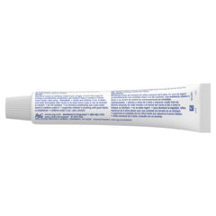 Toothpaste being applied to a toothbrush