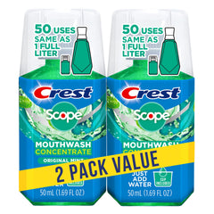 Two travel-size Crest Scope concentrate bottles side by side