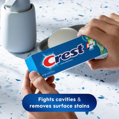 Crest + Scope box displaying enamel protection and fluoride