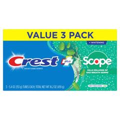 Minty fresh Crest + Scope toothpaste with mint leaves